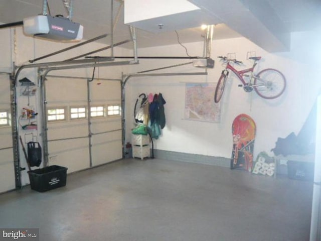 garage featuring a garage door opener