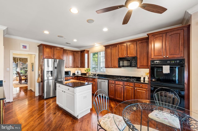 kitchen with black appliances, crown molding, dark countertops, dark wood-type flooring, and decorative backsplash