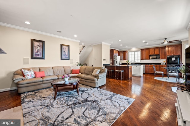 living room with recessed lighting, stairs, ornamental molding, dark wood-style flooring, and ceiling fan