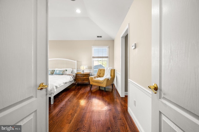 bedroom featuring dark wood-type flooring, lofted ceiling, and recessed lighting