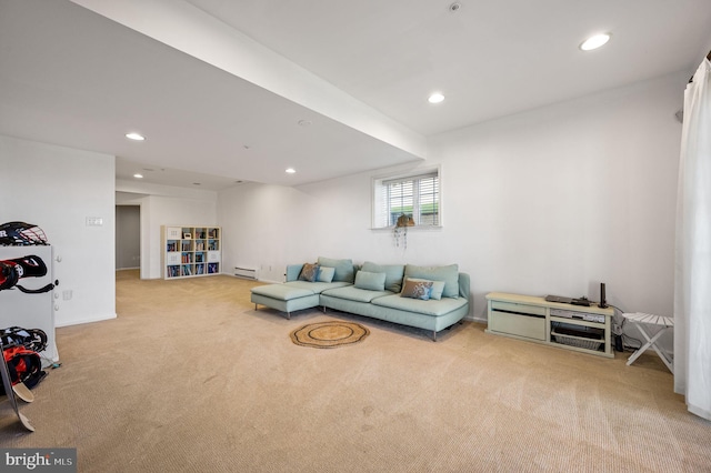 carpeted living room with recessed lighting, a baseboard heating unit, and baseboards