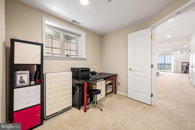 carpeted office space with recessed lighting and baseboards