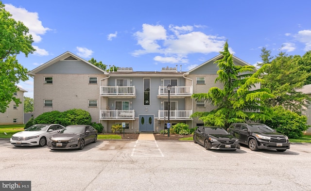 15 Warren Lodge Ct Unit 1D, Cockeysville, MD 21030 - view of building exterior with uncovered parking