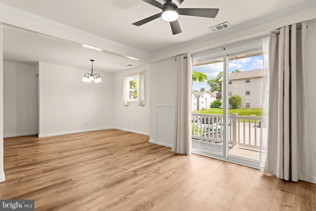 15 Warren Lodge Ct Unit 1D, Cockeysville, MD 21030 - unfurnished room with ornamental molding, a chandelier, a ceiling fan, and light wood-type flooring