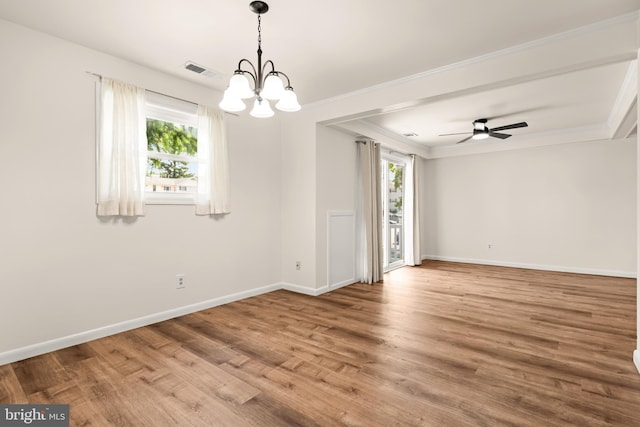 15 Warren Lodge Ct Unit 1D, Cockeysville, MD 21030 - empty room with healthy amount of natural light, a chandelier, crown molding, wood finished floors, and ceiling fan