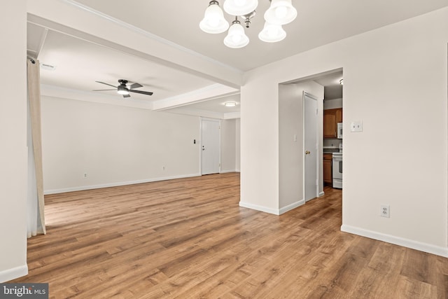 15 Warren Lodge Ct Unit 1D, Cockeysville, MD 21030 - spare room with a chandelier, a ceiling fan, light wood-style flooring, crown molding, and beamed ceiling