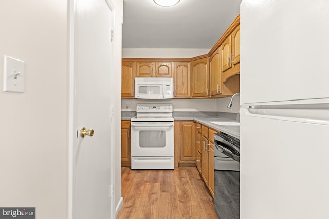 15 Warren Lodge Ct Unit 1D, Cockeysville, MD 21030 - kitchen with white appliances, light wood-style floors, and light countertops