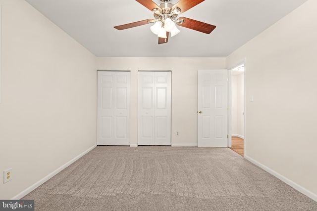 15 Warren Lodge Ct Unit 1D, Cockeysville, MD 21030 - unfurnished bedroom featuring carpet flooring, two closets, and a ceiling fan