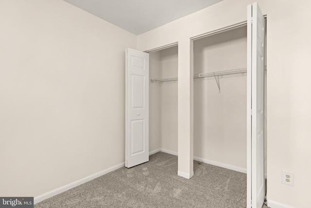 15 Warren Lodge Ct Unit 1D, Cockeysville, MD 21030 - unfurnished bedroom featuring carpet and multiple closets