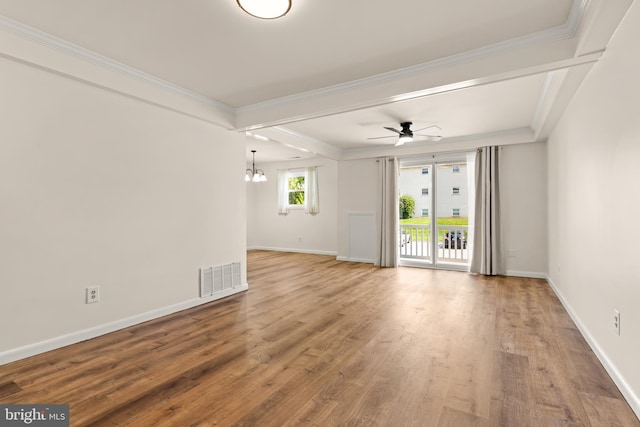 15 Warren Lodge Ct Unit 1D, Cockeysville, MD 21030 - unfurnished living room featuring a chandelier, wood finished floors, ornamental molding, and a ceiling fan