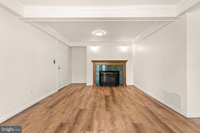 15 Warren Lodge Ct Unit 1D, Cockeysville, MD 21030 - unfurnished living room featuring wood finished floors, crown molding, and a fireplace