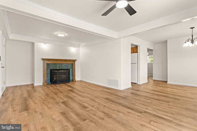 15 Warren Lodge Ct Unit 1D, Cockeysville, MD 21030 - unfurnished living room featuring light wood-style floors, ceiling fan, a chandelier, a premium fireplace, and ornamental molding