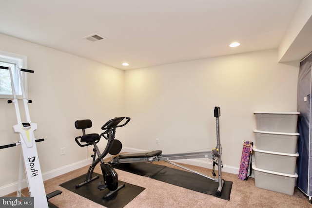 workout area featuring carpet floors, recessed lighting, baseboards, and visible vents