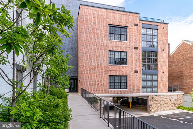 521 N Washington St Unit 201, Alexandria, VA 22314 - view of property with uncovered parking