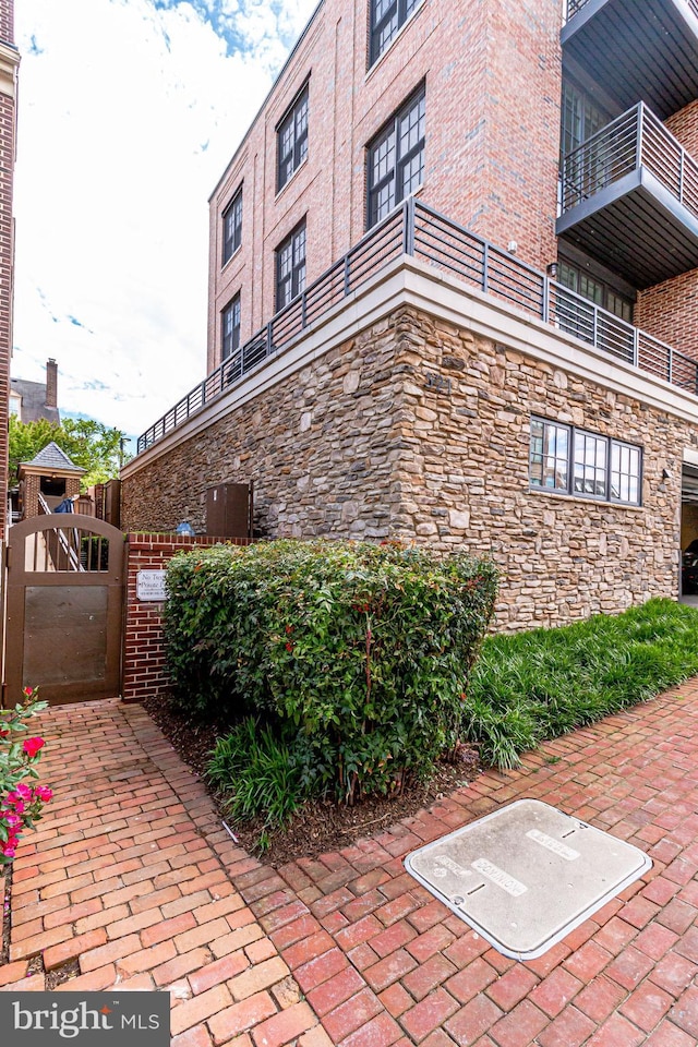 521 N Washington St Unit 201, Alexandria, VA 22314 - view of building exterior featuring central AC unit
