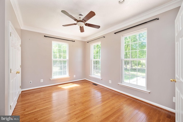 9129 Pebble Beach Ln, King George, VA 22485 - empty room featuring light wood-style floors, baseboards, crown molding, and a ceiling fan