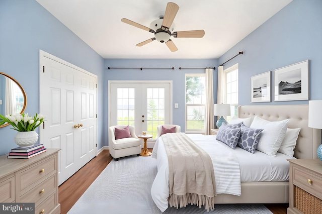 9129 Pebble Beach Ln, King George, VA 22485 - bedroom with access to exterior, french doors, wood finished floors, a ceiling fan, and a closet