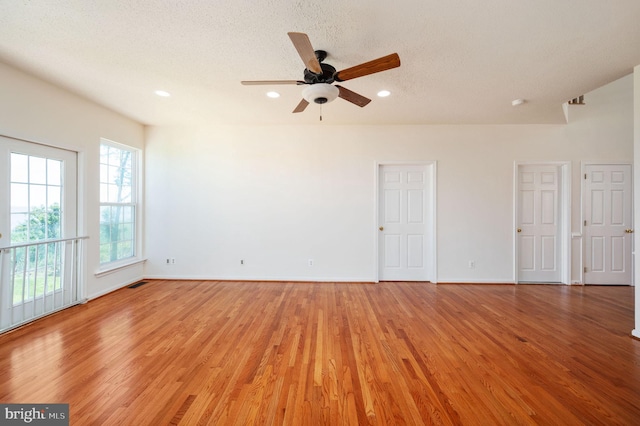 9129 Pebble Beach Ln, King George, VA 22485 - spare room featuring light wood-type flooring, recessed lighting, baseboards, a ceiling fan, and a textured ceiling