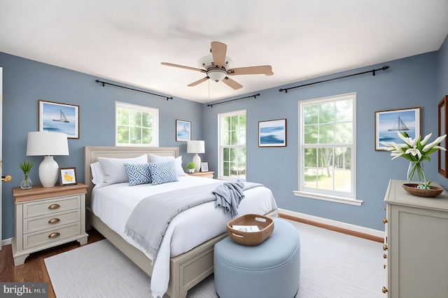 9129 Pebble Beach Ln, King George, VA 22485 - bedroom featuring baseboards, wood finished floors, and a ceiling fan