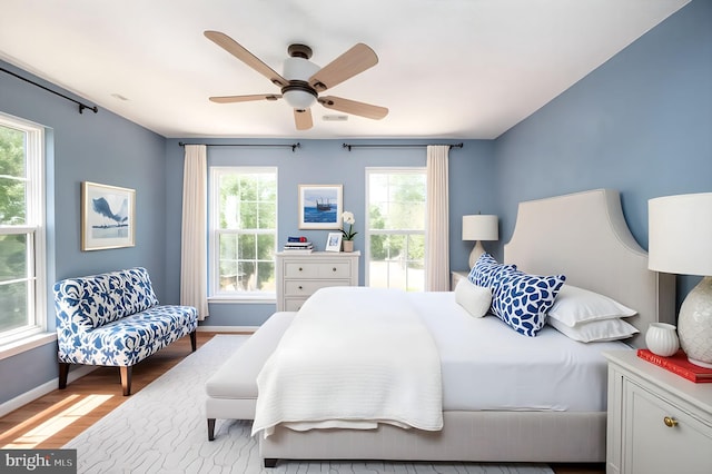 9129 Pebble Beach Ln, King George, VA 22485 - bedroom featuring wood finished floors, baseboards, and a ceiling fan