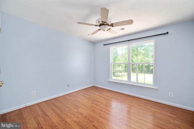 9129 Pebble Beach Ln, King George, VA 22485 - empty room with wood finished floors, baseboards, and ceiling fan