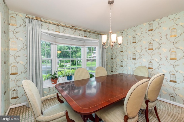 4401 Aragon Pl, Alexandria, VA 22309 - dining area with wallpapered walls, a chandelier, and baseboards
