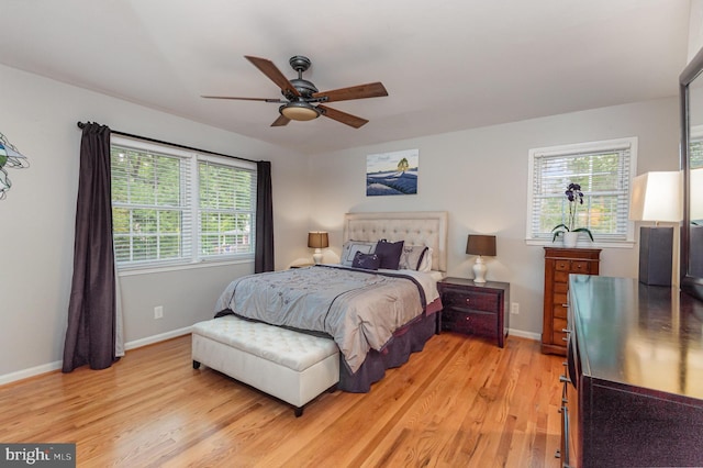 4401 Aragon Pl, Alexandria, VA 22309 - bedroom with light wood-style flooring, multiple windows, baseboards, and ceiling fan