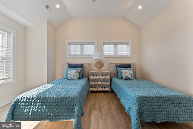 135 Walnut Ave, North Wildwood, NJ 08260 - bedroom featuring visible vents, wood finished floors, and vaulted ceiling