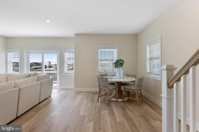 135 Walnut Ave, North Wildwood, NJ 08260 - dining space featuring light wood-style floors, baseboards, and stairs