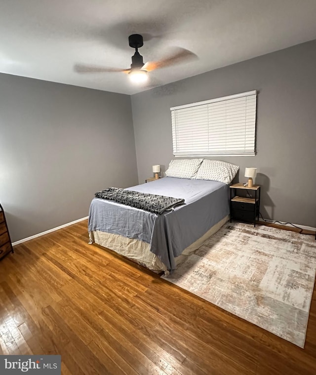 395 Hickory Ave, Carneys Point, NJ 08069 - bedroom featuring hardwood / wood-style floors, baseboards, and a ceiling fan