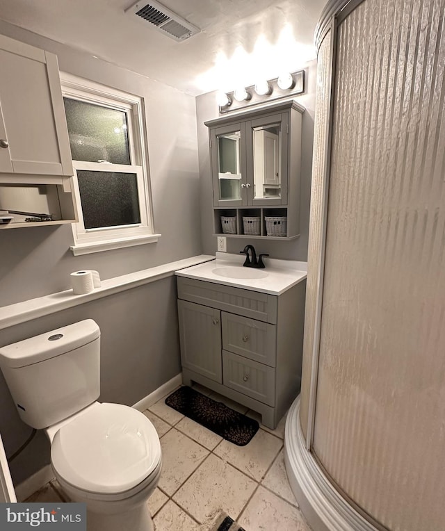 395 Hickory Ave, Carneys Point, NJ 08069 - bathroom featuring toilet, vanity, a shower stall, and baseboards