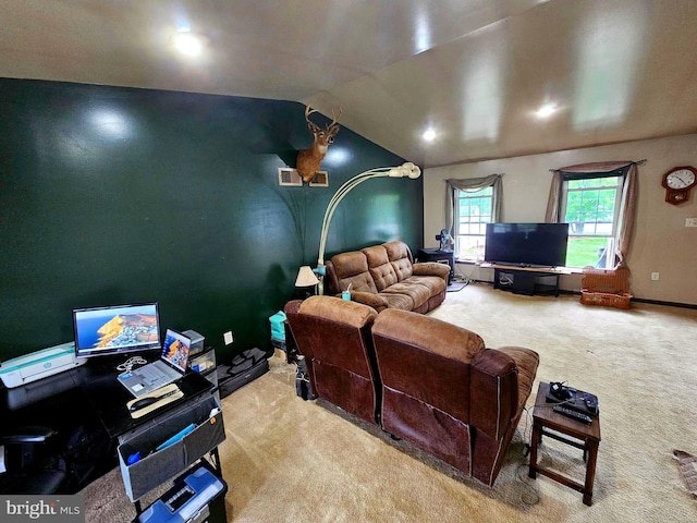 home theater with lofted ceiling and carpet