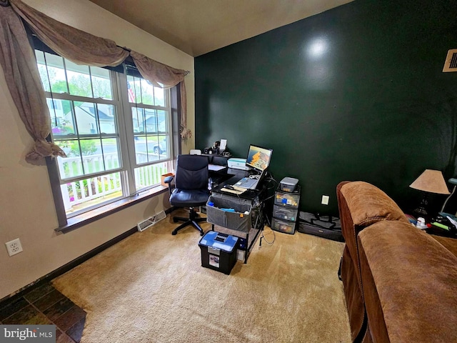 home office with baseboards and visible vents