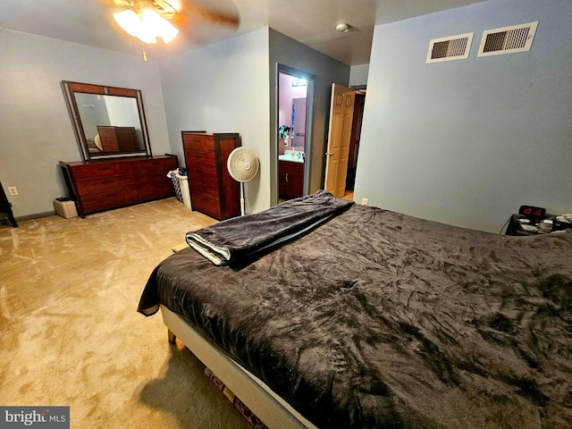 carpeted bedroom with visible vents