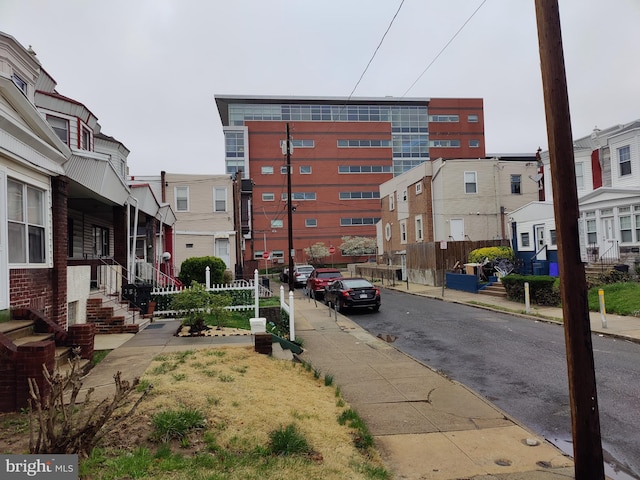 view of street featuring curbs and sidewalks