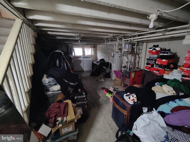 basement featuring independent washer and dryer and gas water heater