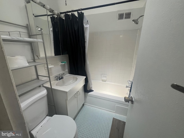 bathroom with vanity, toilet, tile patterned floors, shower / bath combo with shower curtain, and visible vents
