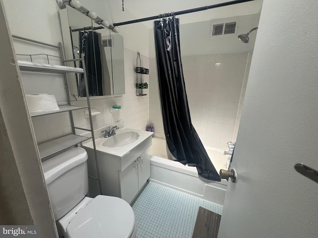 bathroom with visible vents, shower / tub combo with curtain, tile patterned flooring, vanity, and toilet