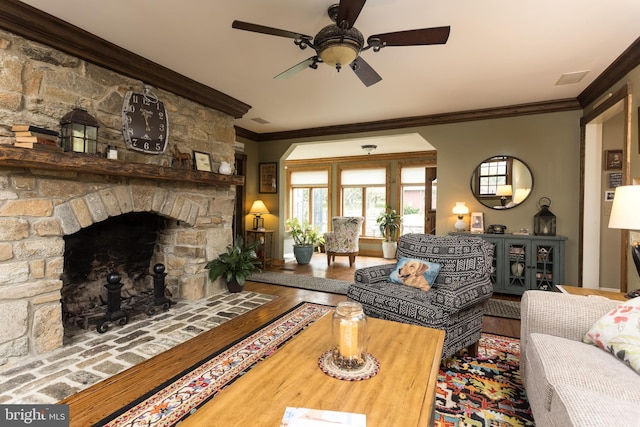 3401 Old Level Rd, Havre De Grace, MD 21078 - living room featuring ornamental molding, wood finished floors, ceiling fan, and a fireplace