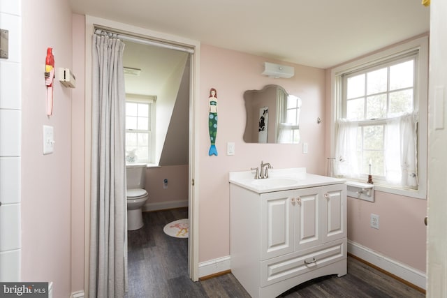 3401 Old Level Rd, Havre De Grace, MD 21078 - bathroom featuring wood finished floors, toilet, vanity, and baseboards
