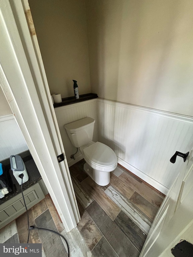 3401 Old Level Rd, Havre De Grace, MD 21078 - bathroom featuring wainscoting, toilet, and wood finished floors