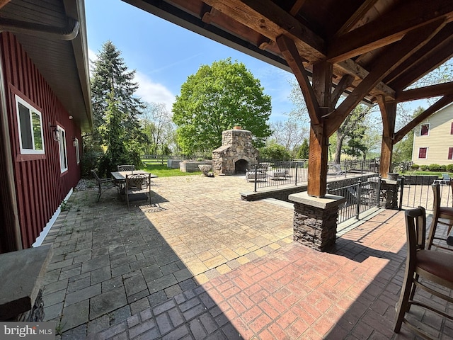 3401 Old Level Rd, Havre De Grace, MD 21078 - view of patio / terrace featuring an outdoor stone fireplace and outdoor dining area