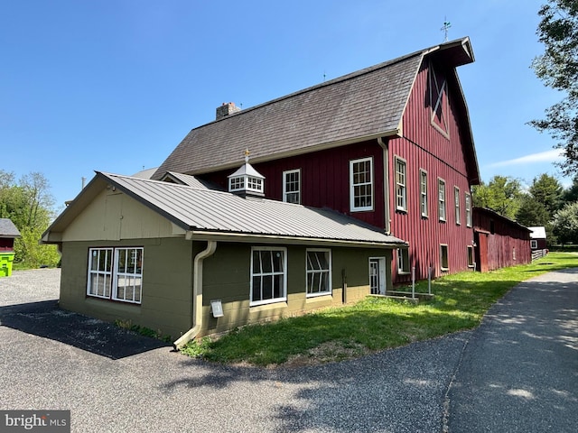 3401 Old Level Rd, Havre De Grace, MD 21078 - view of front of house featuring a chimney, a barn, metal roof, and a shingled roof