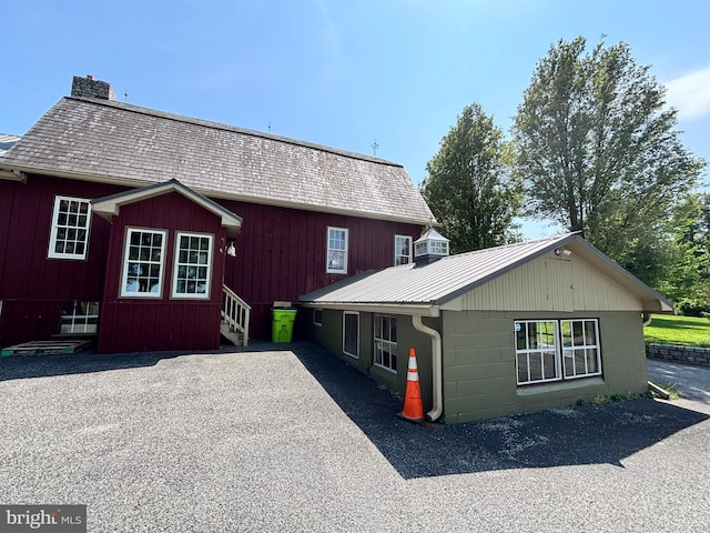 3401 Old Level Rd, Havre De Grace, MD 21078 - back of house featuring a chimney, entry steps, and metal roof