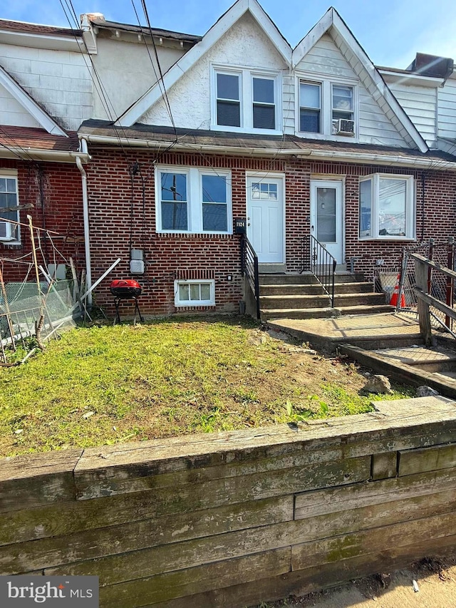 7124 Seaford Rd, Upper Darby, PA 19082 - multi unit property with fence, cooling unit, and brick siding