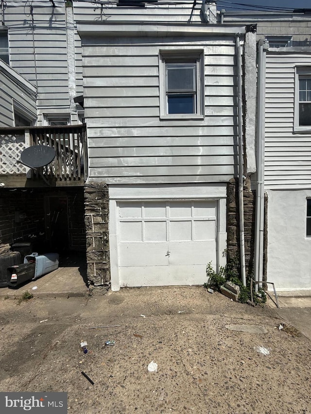 7124 Seaford Rd, Upper Darby, PA 19082 - view of home's exterior with a garage