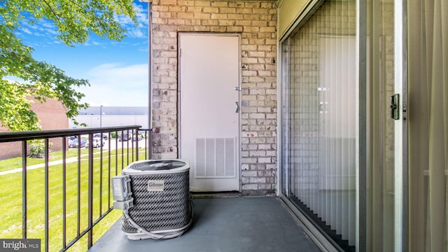 balcony featuring central air condition unit and visible vents
