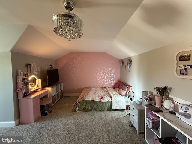 bedroom with carpet floors, baseboards, and lofted ceiling