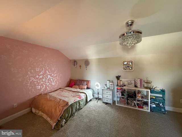 carpeted bedroom with lofted ceiling
