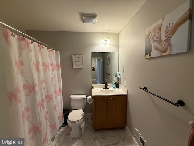 bathroom featuring visible vents, vanity, marble finish floor, toilet, and baseboards